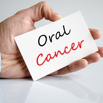 A sign that reads, “Oral Cancer”