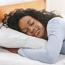 Woman sleeping in bed