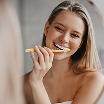 Woman brushing her teeth